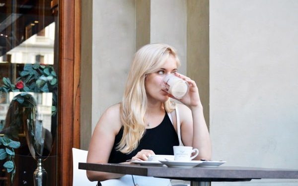 blonde girl drinking coffee